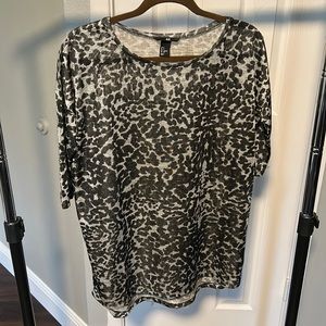 Oversized, semi-sheer snow-leopard print top.